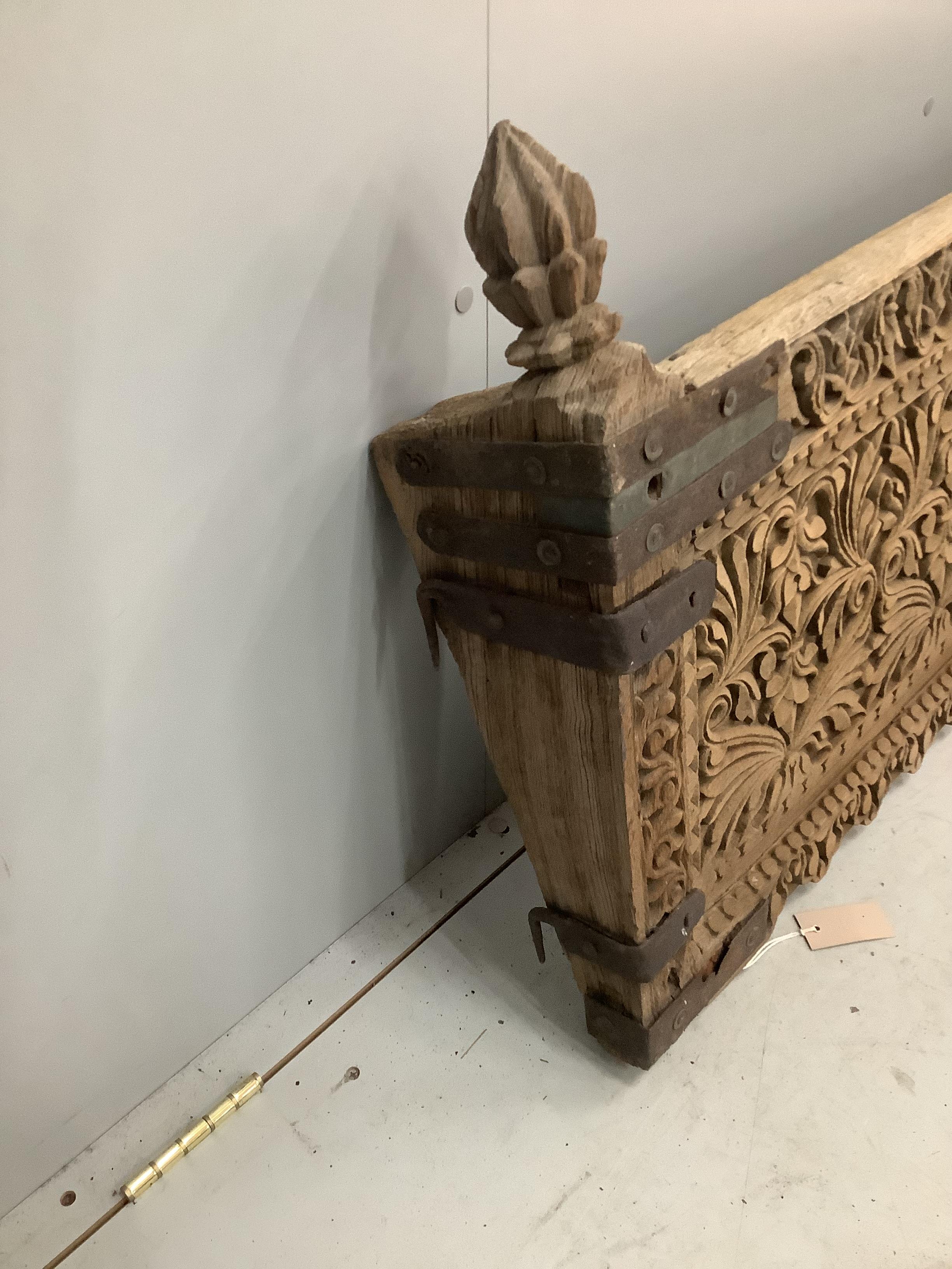 An Indian carved hardwood panel (probably a bench or bed section), width 112cm, height 61cm